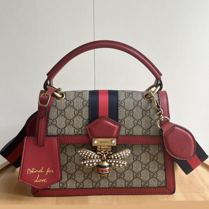 G*u*i top handle bags